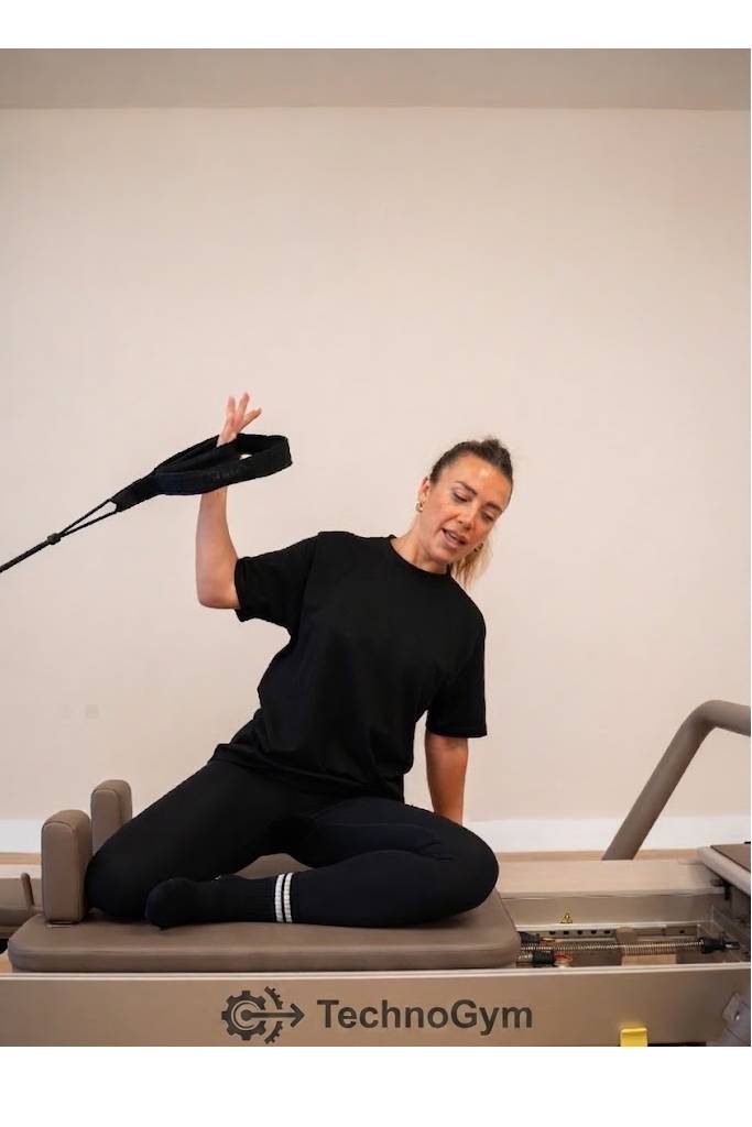 Leman Bulut leading a 1-to-1 Reformer Pilates session